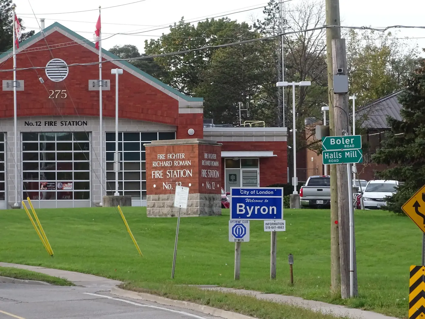 Fire Station No. 12 and a City of London Welcome to Byron sign at Boler Road and Halls Mill Road.
